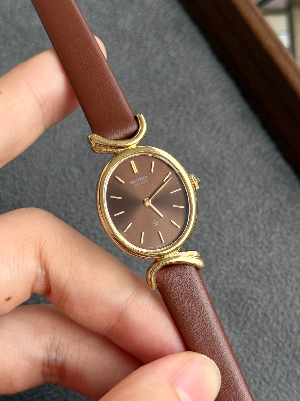 Rare Vintage 1980 Seiko Gold-Plated Oval Sunburst Brown Dial with Curved Lugs