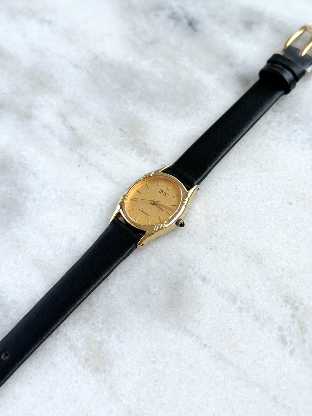 Vintage Seiko 1980s Exceline Gold-Plated Oval Gold Textured Dial