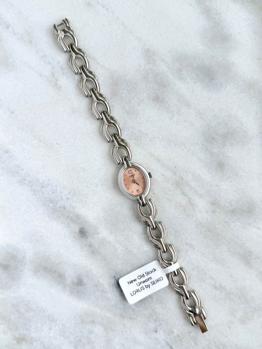 New Old Stock Unworn Lorus Silver Toned with Peach Oval Dial