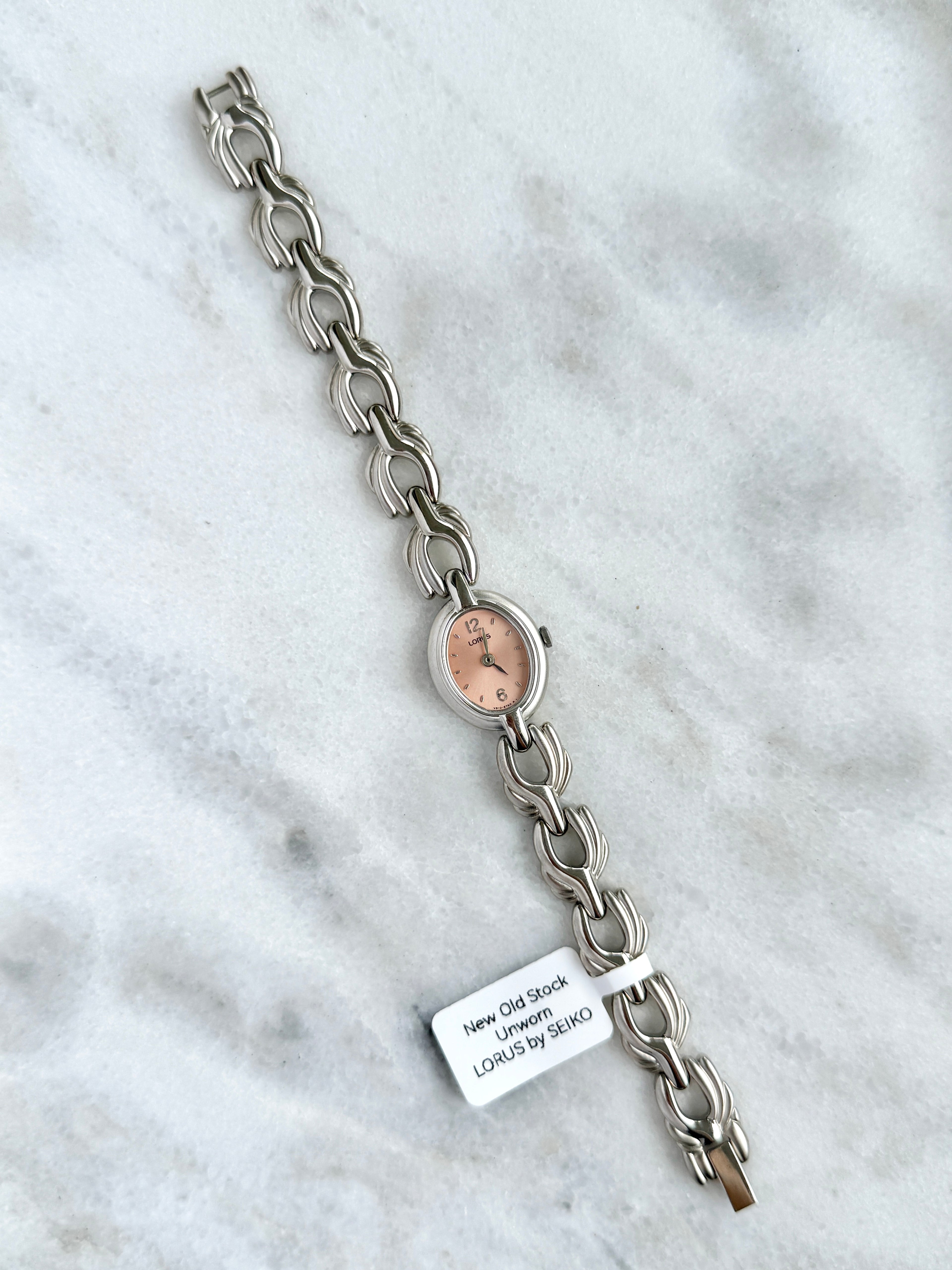 New Old Stock Unworn Lorus Silver Toned with Peach Oval Dial