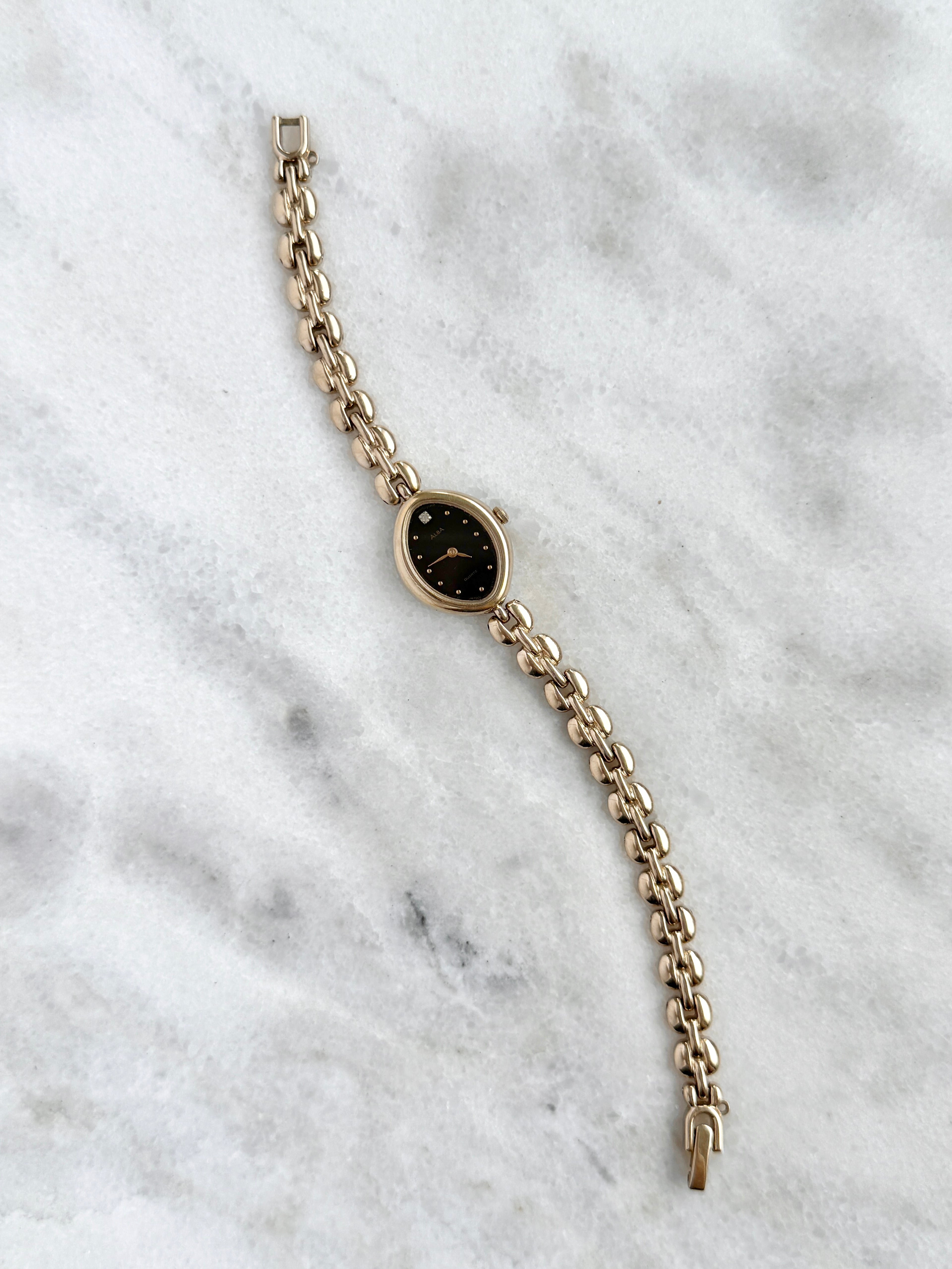 Vintage Alba Champagne Gold Marquise Case with Black Dial