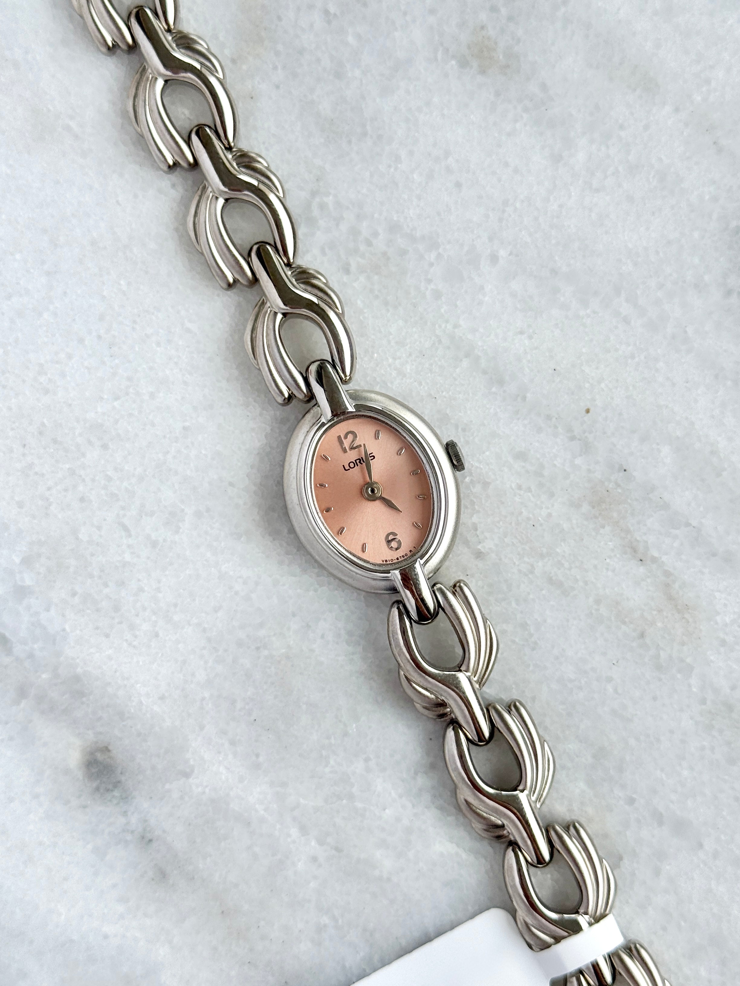 New Old Stock Unworn Lorus Silver Toned with Peach Oval Dial