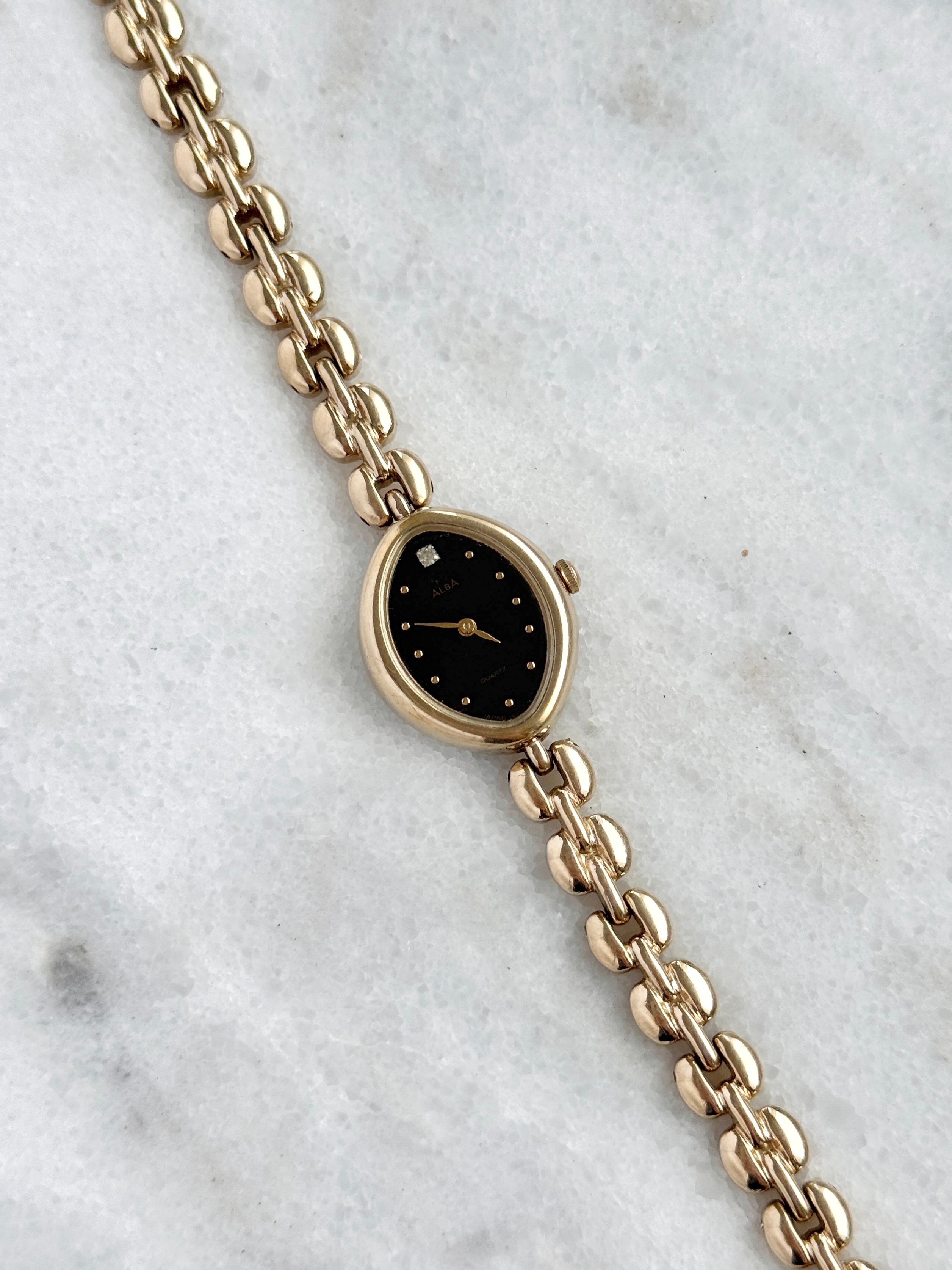 Vintage Alba Champagne Gold Marquise Case with Black Dial