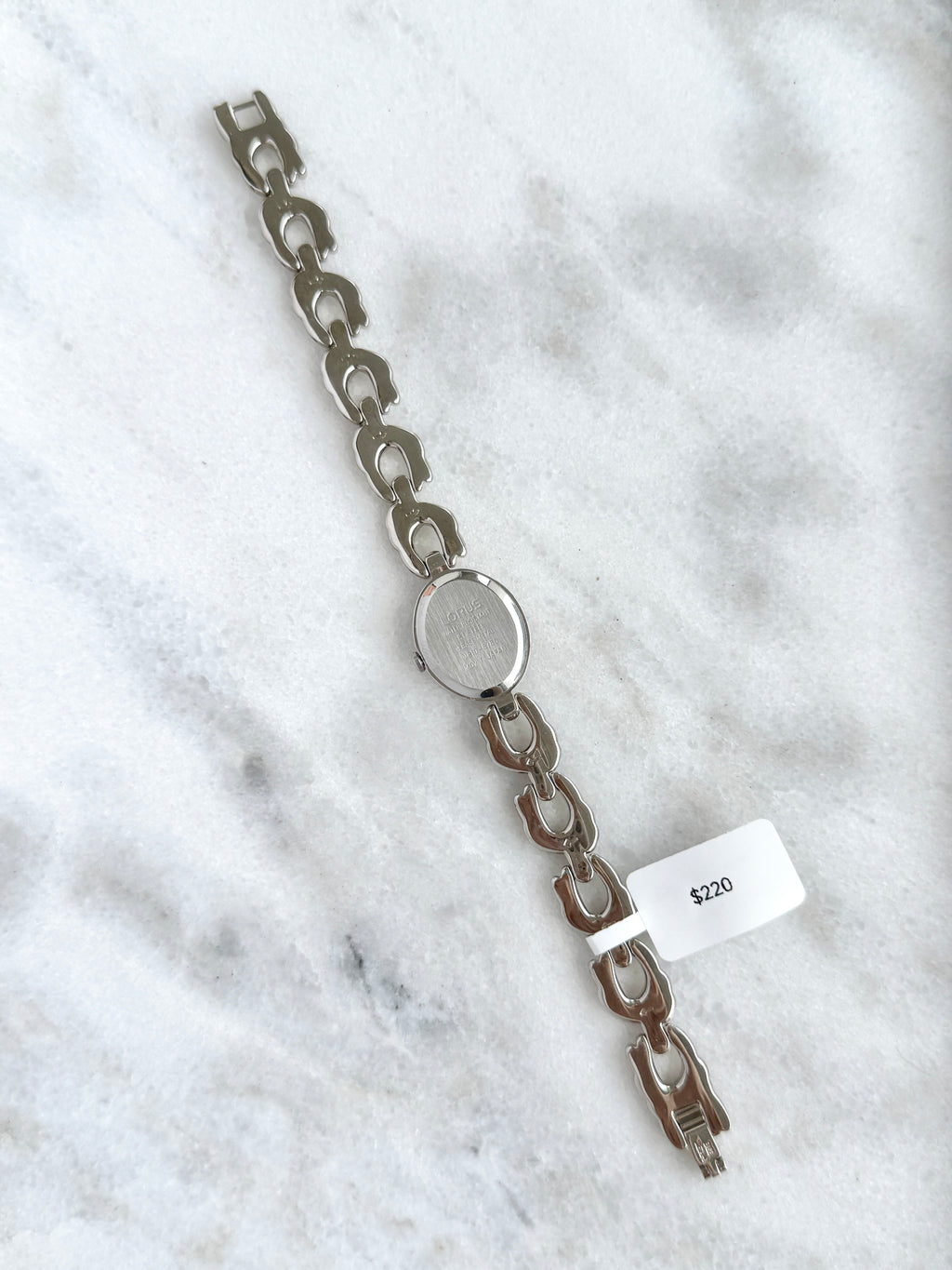 New Old Stock Unworn Lorus Silver Toned with Peach Oval Dial