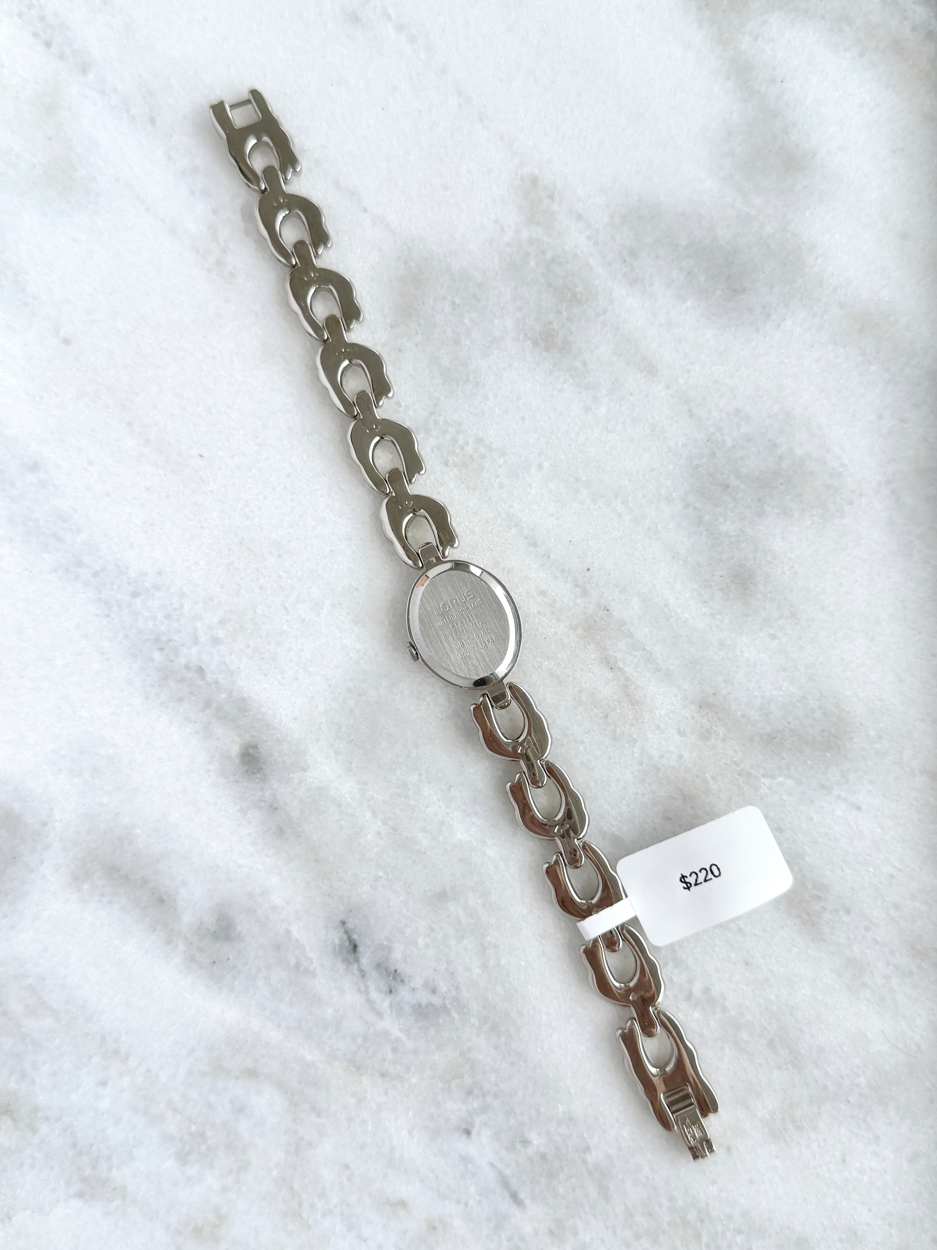 New Old Stock Unworn Lorus Silver Toned with Peach Oval Dial