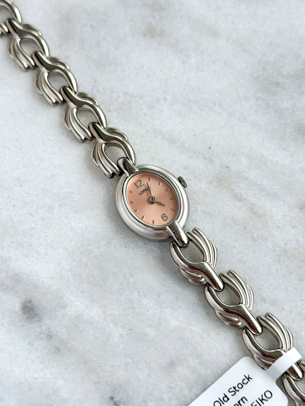 New Old Stock Unworn Lorus Silver Toned with Peach Oval Dial