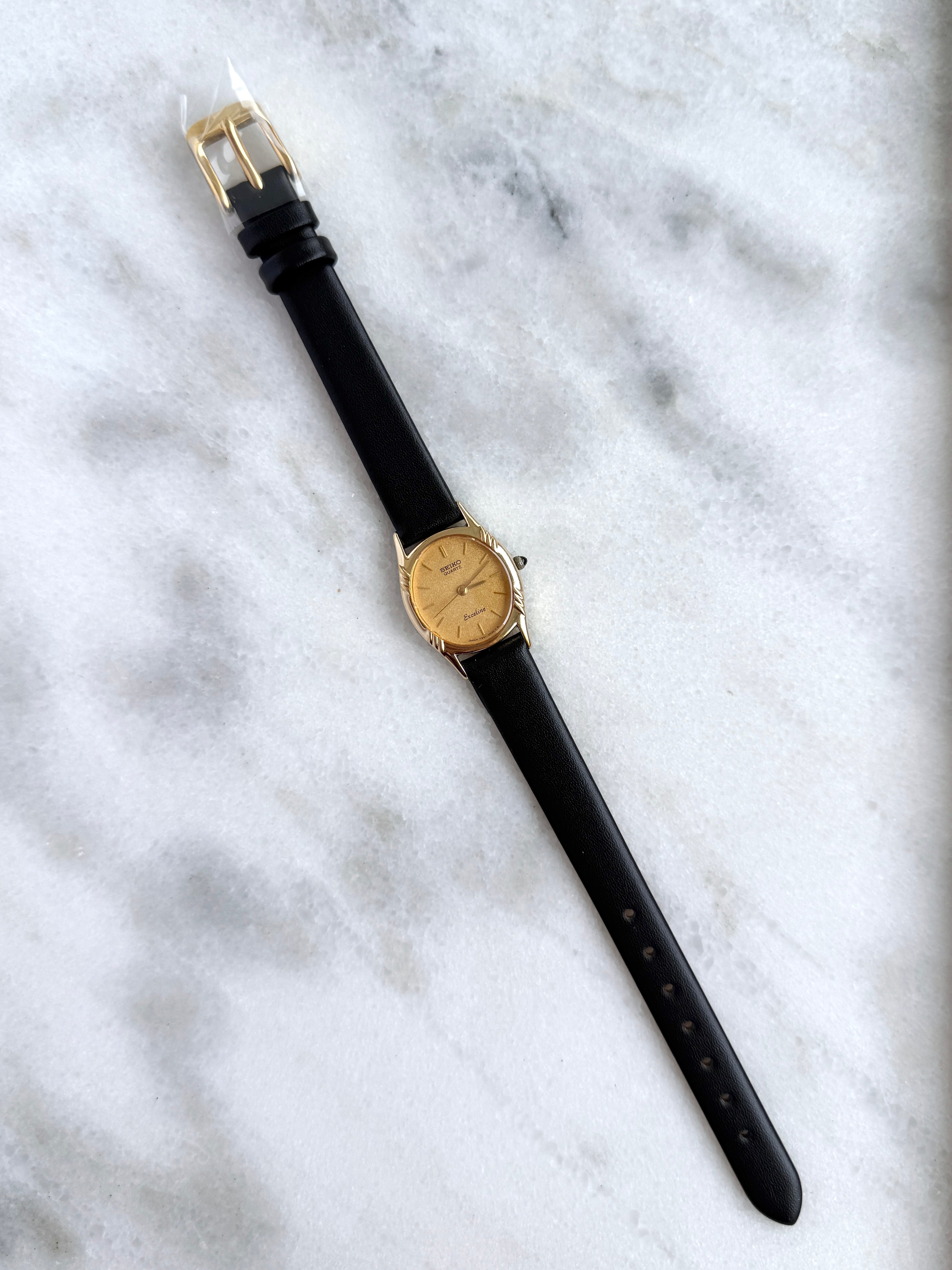 Vintage Seiko 1980s Exceline Gold-Plated Oval Gold Textured Dial