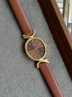 Rare Vintage 1980 Seiko Gold-Plated Oval Sunburst Brown Dial with Curved Lugs
